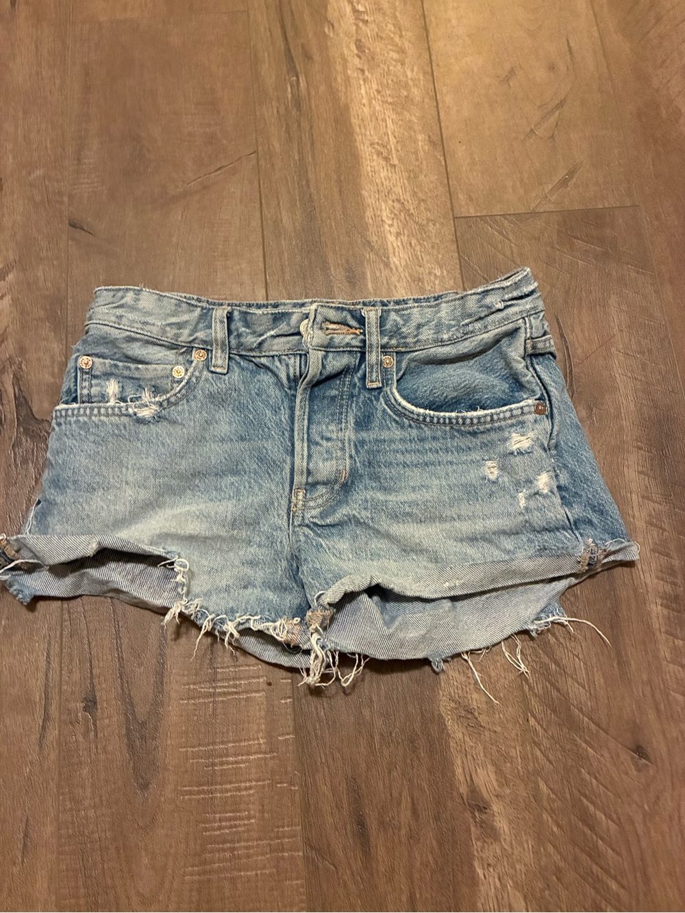 We The Free Light Wash Distressed Denim Cutoff Shorts